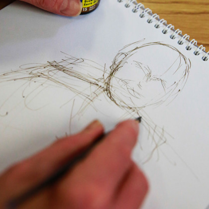 image of a person sketching