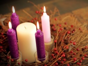 image of an advent wreath with the four outer candles lit