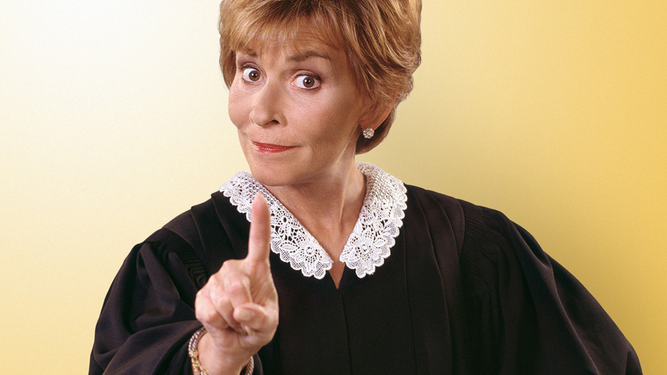 judge judy wagging a finger at the viewer
